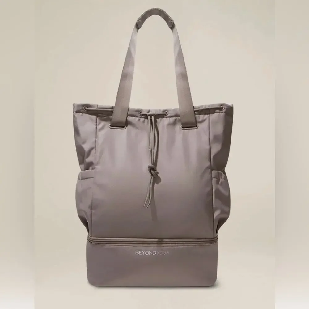 Beyond Yoga Taupe Drawstring Top Backpack with Lower Zip Compartment